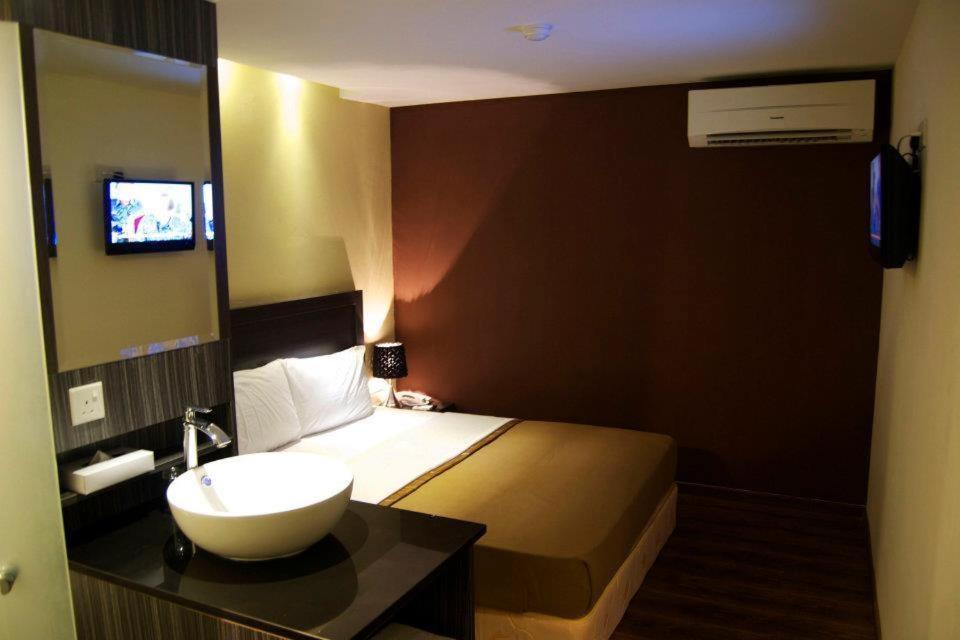Zotel Business & Leisure Hotel Kuching Rum bild